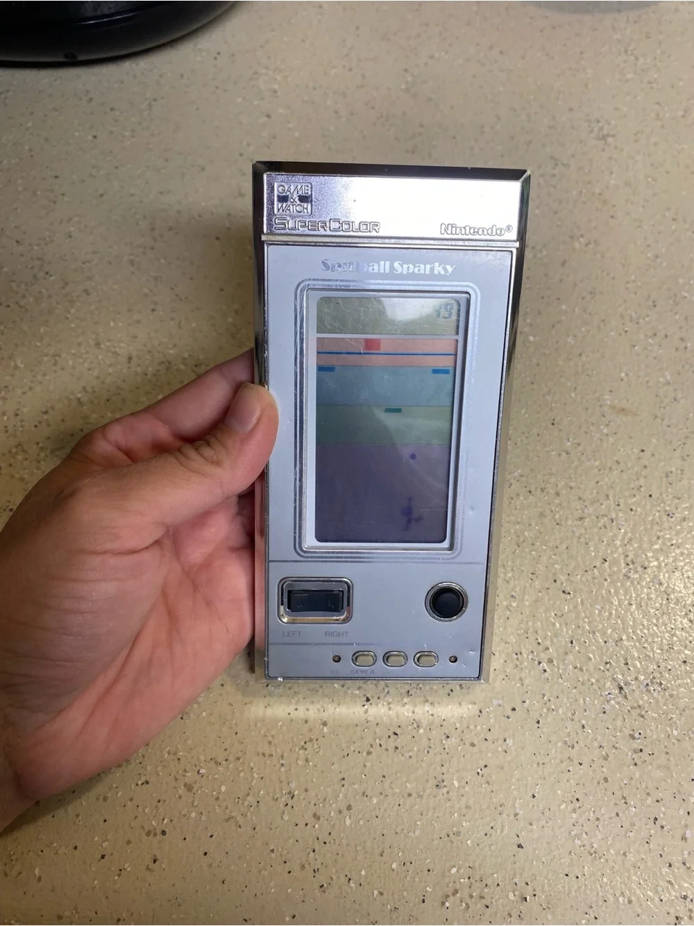 Nintendo SuperColor Spitball Sparky Handheld Console - Silver